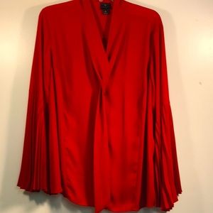 Lush Red long pleated sleeved buttoned blouse with a beautiful tie neckline. 1X